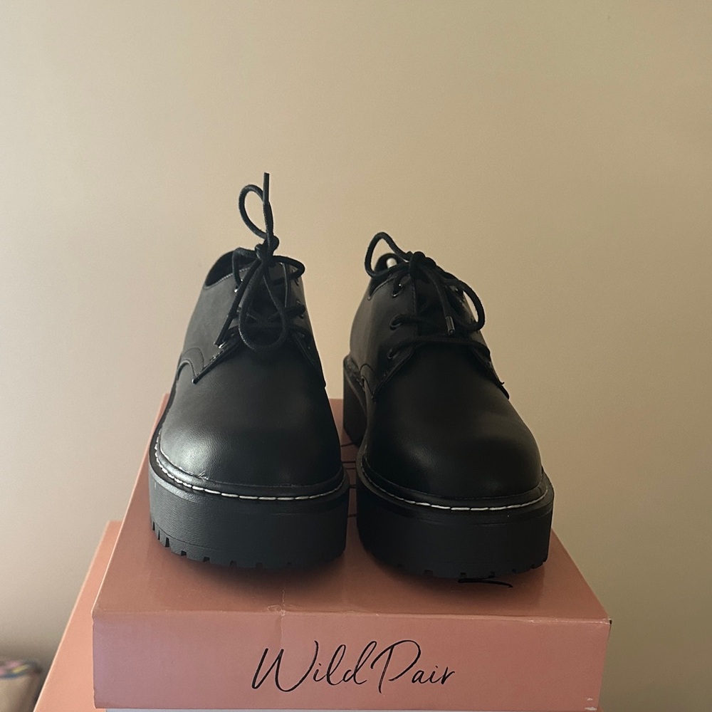 Wild Pair Black Lace-Up Platforms